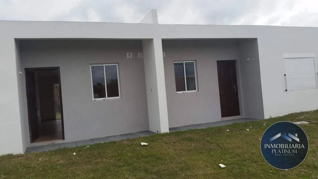 Venta casa 2 dormitorios, garaje y terreno. Colonia Nicolich - Imagen 1