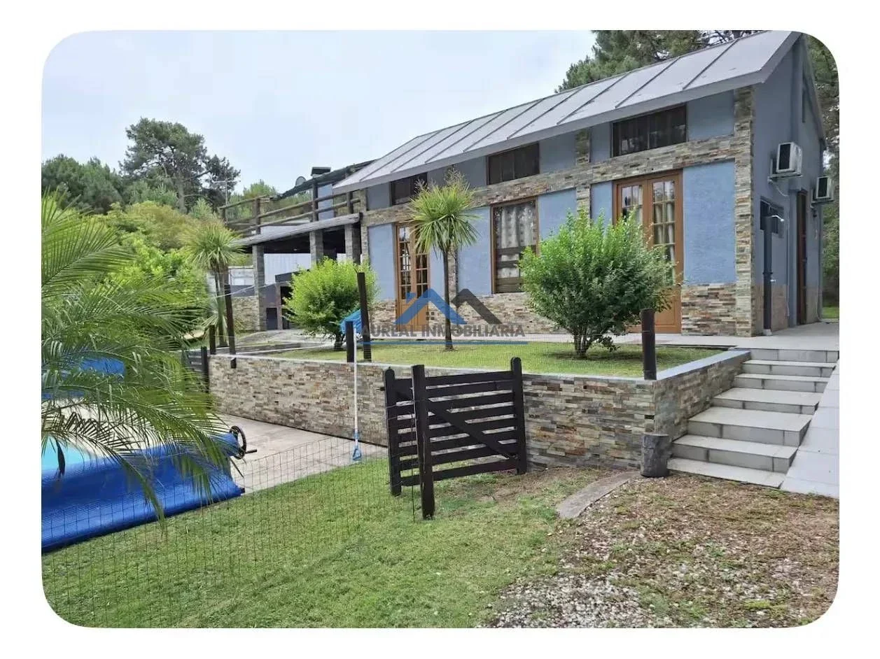 Venta Casa 4 dormitorios con cochera y piscina en Club del Lago - Maldonado - Imagen 1