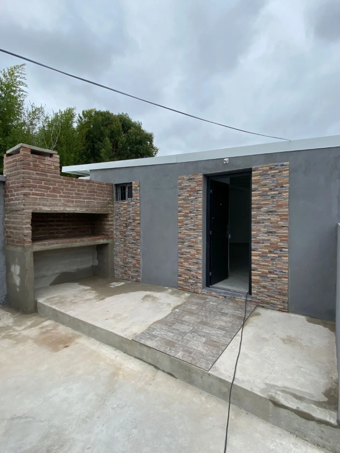 Casa en alquiler c/ cochera en Barros Blancos - Imagen 1