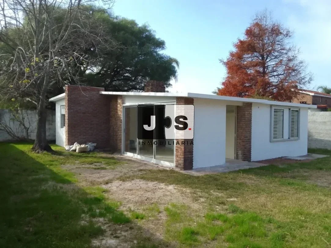 Alquilo Casa a estrenar 2 dormitorios y 2 baños con cochera en Solymar - Imagen 1